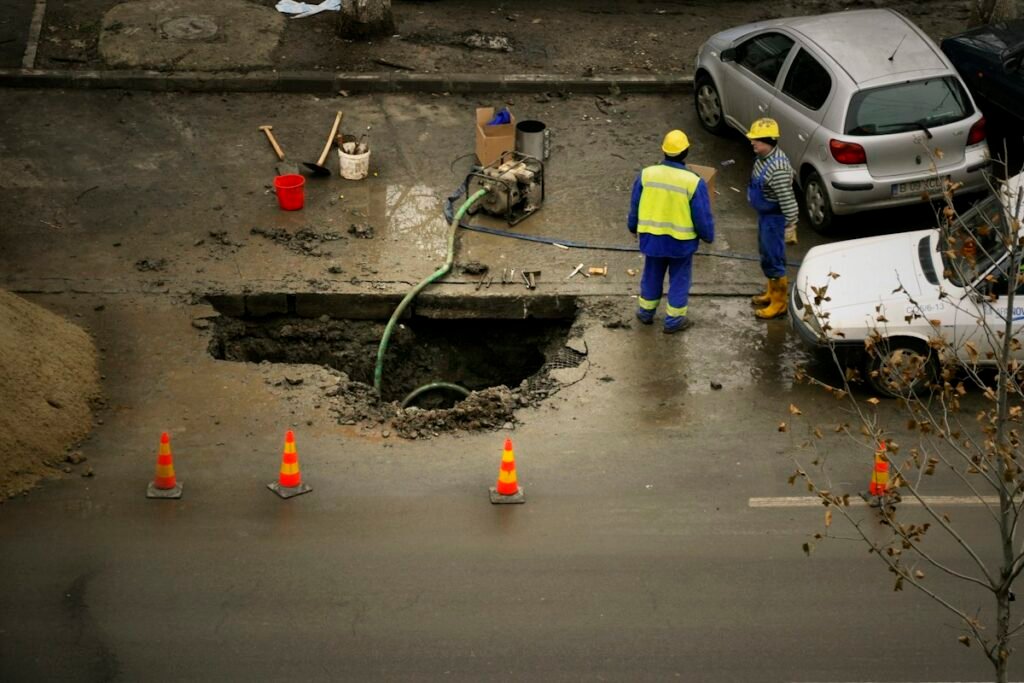 Drainage inspection work on a street drainage system
